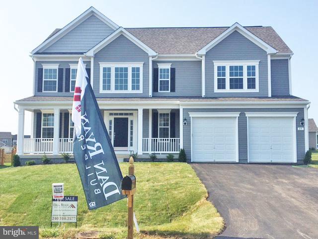 READY NOW!! Dan Ryan Builders popular Oakdale plan inSpringdale Farm's near Inwood shopping & I81 access.Stunning 4 bedroom, 2 1/2 bath with front porch, study, white kitchen cabinets, stainless appliances & backsplash, family room gas fireplace, custom mud room shelving, owner's suite deluxe bath, walkup basement with 3piece rough in to finish later, .33 ac lot adjacent to 1 1/2 acre common area.