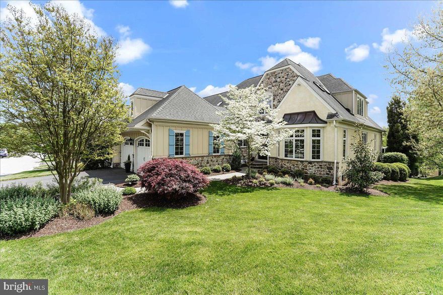 Stunning one-of-a kind residence in the Haverford Reserve. This expanded “Treymore Great 
Room” model has a fully customized layout and finishes suitable for those who appreciate the 
finer things in life. The original owners worked closely with the builder to creatively maximize 
the open floor plan to integrate spectacular living and dining spaces. And the current owners
put their stamp on it with breathtaking design and additional improvements. The home enjoys
one of the best lots in the neighborhood, providing both privacy and gorgeous views from the
large, newly built, maintenance-free deck.
The bespoke private office located off of the foyer is enveloped in cherry paneling and a built-in
credenza. The coffered ceiling and bay window make this the perfect haven for an executive.
The commercial appointed Kitchen has a sleek, oversized stainless island with a waterfall edge. 
Marble counters and backsplash with a hidden wall of storage complement the contemporary 
feel of the space. Top of the line, high performance appliances and a glass front pantry will 
satisfy the desires of any chef. The Kitchen leads into a bright and beautiful beamed Great 
Room anchored by a stone cast gas fireplace, built-in cabinetry, and a large dining area. 
The floor plan features a first-floor Main Suite with coffered ceilings; a luxurious spa-inspired
Bathroom and spacious designer custom closets with high end features - such as locking jewelry 
drawers. The entire first floor has wide plank hickory wood flooring and is heated with an ultracomfortable radiant heating system.
The second floor has three additional sleeping rooms with ensuite bathrooms. (The third does 
not have immediate egress or a closet.) The landing features a gracious curved library, and
there is a bonus closet/storage room that can serve multi purposes.
The fully finished Lower Level features a stunning 1500 bottle, temperature-controlled wine 
cellar custom built by Joseph and Curtis. The entire level was carefully designed to meet the 
needs of those who like to entertain as well as exercise enthusiasts. There is a home gym with 
rubber mat flooring and a large entertaining area with a full wet bar. The Lower Level is graced 
with loads of natural light and leads straight out to a covered hard scape patio.
The home features many thoughtful upgrades that you will appreciate on a day-to-day basis.
Zoned HVAC on each floor, a water filtration system, integrated sound system throughout the 
home, and a full house Generac generator make life very comfortable and hassle free. And this 
home currently enjoys one of the lowest tax bills in the community.
Haverford Reserve is a community of 100 luxury carriage homes located in the heart of the 
Main Line amidst 124 acres of preserved land, walking and bike trails. There is easy access to 
Philadelphia and New York City via highway or train.