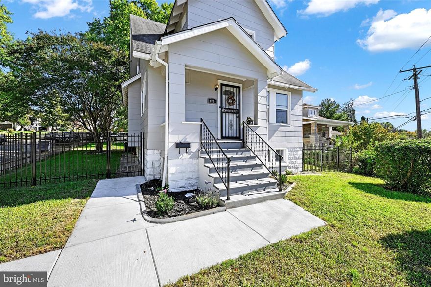 Welcome to this beautifully renovated 5-bedroom, 2-bath beauty at 4800 Frankford Ave! Completed in 2023, this home offers open-concept living with stunning tray ceilings and custom lighting throughout. The main level features a bright and airy living room, a spacious dining room filled with an abundance of natural light, and a stylish kitchen boasting shaker cabinets, quartz countertops, a complementary tile backsplash, and stainless steel appliances. The convenient mudroom will be a favorite for shedding coats and shoes. The main floor also includes a bedroom, perfect for guests or a home office. Upstairs, you'll find three generously sized bedrooms with new carpeting and a full bath with gorgeous tile work. The finished lower level offers additional living space, a fifth bedroom, a full bath, a gym area, and a large family room. Enjoy outdoor living on the corner lot and a fully fenced back yard with endless possibilities. Move-in ready and conveniently located near shopping, restaurants, and commuter routes—schedule your tour today!