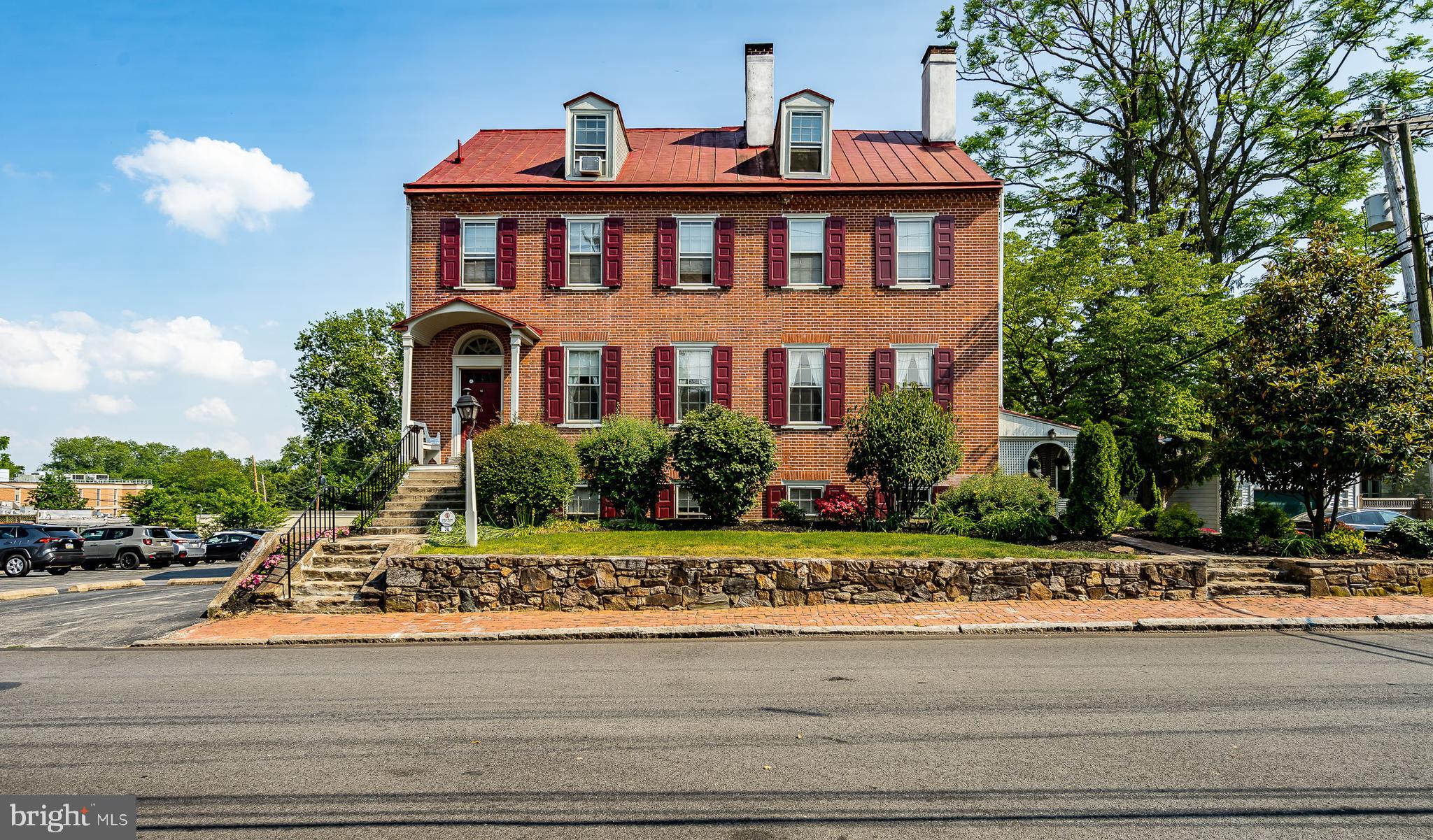 This exceptional residence dates back to 1830. A one of kind single family residence occupied on the main level by Sellers. Spectacular and high end improvements are enjoyed by the owners with the luxury of collecting addition rent from 2- 3 bedroom 1- 2 bedroom apartments. Also with a private entrance is a one bedroom in-law suite. The original charm is both inside and outside. The rear yard is spacious and includes lush landscaping. Rarely found in the middle of the Borough. A unique 2 car detached garage is included of a dismantled barn. It is prime location walking distance to all Borough amenities.