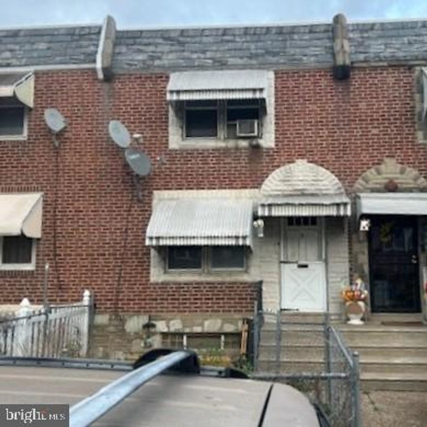 Great two-story brick rowhome built in 1925, located in the Juniata section of Northeast Philadelphia. The main level features a spacious living room, formal dining room, and kitchen. The second floor offers two well-proportioned bedrooms and one full bathroom. The home provides approximately 808 square feet of living space.
Additional highlights include a full unfinished walk-out basement, ideal for storage or future finishing, and a rear yard with off-street parking, a valuable feature in the area.