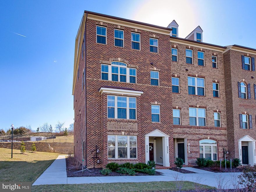 Light-filled, end-unit condo shows like a model! Looks brand new! Spacious living area w/hardwoods, fantastic gourmet kitchen w/white cabinets, granite, tile backsplash, breakfast bar, stainless appliances! Extra-lg Master w/walk-in closets. 2 more large bedrms! Convenient 2nd fl laundry w/sink, closet! Enjoy coffee on the balcony! Walk to Villages of Urbana amenities: shops, restaurants, schools!