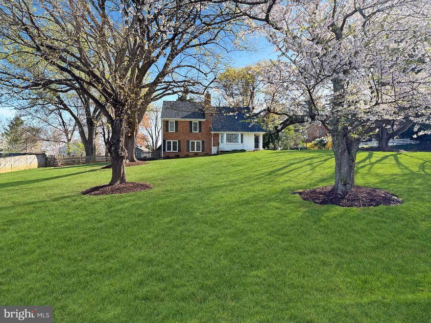 You have got to see this original Donald Lamborne Williamsburg Village classic!  Unique, charming, and breathtaking are the first of many positive adjectives that will come to mind.   You will be awestruck by a spacious kitchen featuring a modern center island/table with exotic stone that matches the countertops, as well as top-of-the-line WOLF appliances including an induction range overlooking the dining area through a pass-through.   The elegant dining room with exposed wood beams offers a feeling of serenity and peacefulness calling back to a more simple time, but in a most luxurious way.  Additionally, an inviting screened-in patio with ceiling fans offers a comfortable spot to relax outdoors and watch the ballgame while overlooking your beautiful .75 acre yard with your own decorative pond!  Moving upward, the layout unfolds beautifully: one level features a single bedroom/office as well as a family room; the next level offers two bedrooms—one serving as the primary retreat—along with a full bath; then there’s a level with another bedroom complemented by its own full bath, capped off by an additional bedroom on the top level. Notably, the two upper-level bedrooms have recently been updated with mini-split air conditioning systems for enhanced comfort.  Outside, a pristine newly sodded lawn, a convenient EV car charger, and a Starlink satellite dish to keep you connected complete this beautifully updated, one of a kind home!