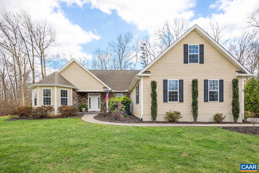 Open house May 3rd 1-3:00! Custom-built one-level living in the desirable Godalming subdivision! This meticulously maintained 3BR/2BA home offers over 2,700 finished sq ft on just over 2 beautifully landscaped acres. A long paved driveway leads to a thoughtfully designed home featuring 9-ft ceilings, vaulted and cathedral details, and hardwood flooring throughout the main living areas. The gourmet kitchen opens to light-filled living and dining spaces, ideal for everyday comfort and entertaining. The spacious primary suite includes a large walk-in closet and an oversized walk-in shower designed for ease and comfort. Two additional bedrooms are conveniently located on the main level, with a second full bath featuring a charming clawfoot soaking tub. A bonus room over the garage provides flexible space for guests, a home office, or hobbies. Enjoy the covered rear porch overlooking a peaceful backyard just beginning to bloom for spring. Offering quality construction, space, and the ease of main-level living, this home is a rare find in Ruckersville.,Granite Counter,Maple Cabinets,Fireplace in Great Room,Fireplace in Living Room
