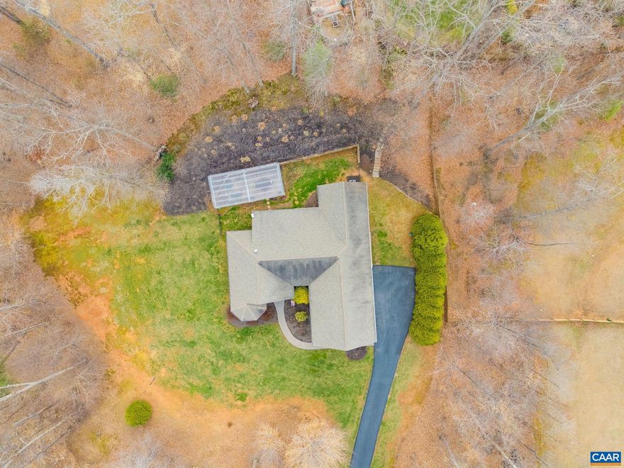 Custom-built one-level living in the desirable Godalming subdivision! This meticulously maintained 3BR/2BA home offers over 2,700 finished sq ft on just over 2 beautifully landscaped acres. A long paved driveway leads to a thoughtfully designed home featuring 9-ft ceilings, vaulted and cathedral details, and hardwood flooring throughout the main living areas. The gourmet kitchen opens to light-filled living and dining spaces, ideal for everyday comfort and entertaining. The spacious primary suite includes a large walk-in closet and an oversized walk-in shower designed for ease and comfort. Two additional bedrooms are conveniently located on the main level, with a second full bath featuring a charming clawfoot soaking tub. A bonus room over the garage provides flexible space for guests, a home office, or hobbies. Enjoy the covered rear porch overlooking a peaceful backyard just beginning to bloom for spring. Offering quality construction, space, and the ease of main-level living, this home is a rare find in Ruckersville.,Granite Counter,Maple Cabinets,Fireplace in Great Room,Fireplace in Living Room