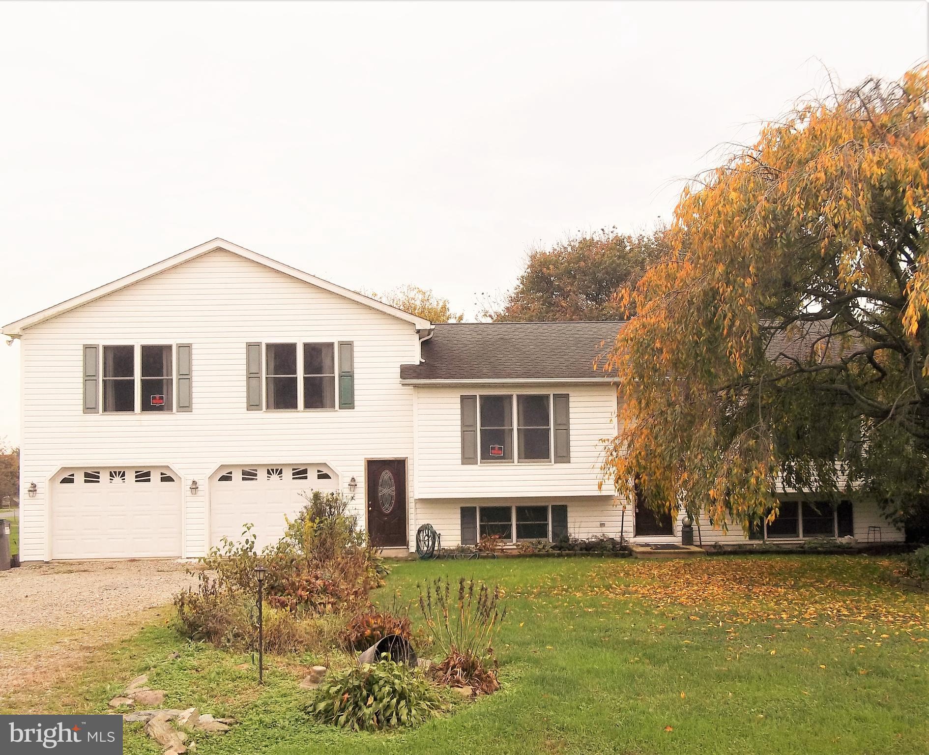 Home has plenty of potential with some TLC. Sits on approx. an acre of land and is a corner lot. Large oversized pole barn 2 car garage on property. Great for the contractor or landscaper that needs the storage.