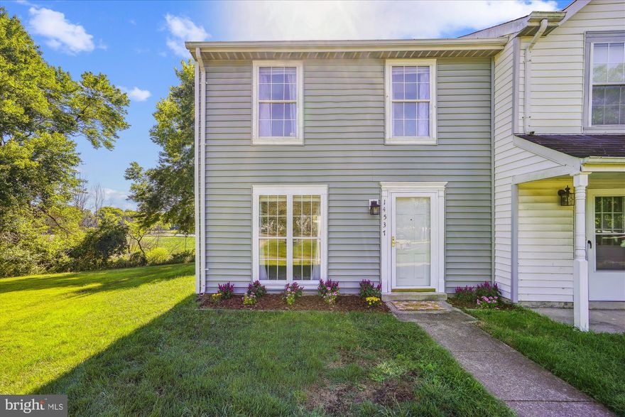 BEAUTIFUL WATER VIEW  End unit Townhome Features 2 Primary Bedrooms(PRIVATE BATHROOM IN EACH BEDROOM)   & a 1/2 bath on the main level. Updated Hardwood Plank flooring throughout the main level, Custom painted throughout.  Close to major routes and shopping.