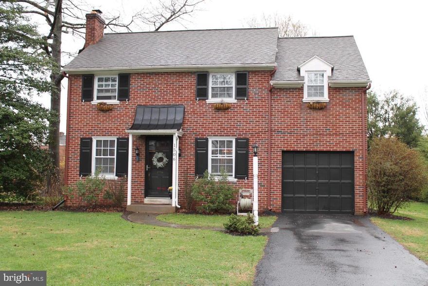 Beautifully kept Brick home, updated kitchen, hardwood floors throughout, wood burning fireplace, updated bathroom, screen porch, level yard, newer windows, doors & roof, basement with laundry, utility, office & play area, updated/rewired electric, 1 car garage.