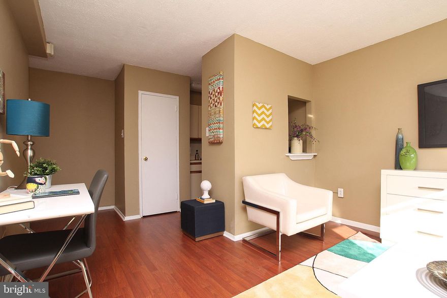 This corner unit on the top floor at amenity-rich River West has views for days. Whether you're a first-time buyer, downsizing, looking for a pied-a-terre, an investor or some combination of the above, this condo is a match. The building has an on-site fitness center, community room, 24-hour security, lobby restaurant and nail salon, and nearby parking for a monthly rental fee. The unit features a spacious living area with enough room for dining or create a casual pub-height breakfast bar at the passthrough into the galley kitchen. The kitchen is perfect for heating up leftovers when you're not up for exploring the vast Center City dining scene and features built-in shelves around the passthrough, full size appliances, and a nearby coat closet that could easily convert to a pantry. The bathroom is retro-cool with gray and pink tile wall and tub surround, matching tile floors and sleek white vanity. The bedroom features windows on two walls with views of the skyline and beyond plus a double-wide closet. The location can't be beat, with easy access to the Walnut St shopping corridor and tons of great restaurants just outside the lobby--like local favorites Poi Dog and Res Ipsa, one of Bon Appetit's 50 Best New Restaurants. Enjoy community greenspace at Rittenhouse Square and the Schuylkill Banks; both are within a few blocks.