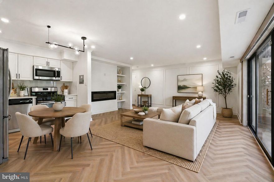 Welcome to this beautifully updated 3-bedroom, 2-bath residence in the sought-after McLean Hills community, offering approximately 1,086 square feet of thoughtfully designed living space. 

The redesigned kitchen includes stainless steel appliances such as the French door refrigerator, gas range and built-in microwave, and upgraded countertops, creating a more open floorplan. The main living area is elevated by a sleek electric fireplace, custom built-ins, crown molding, and striking herringbone flooring. Additional features include dimmable lights in the living area and primary bedroom as well as a smart thermostat.

The primary suite features crown molding and a fully renovated bathroom with walk-in shower, while two additional bedrooms provide flexibility for guests, a home office, or additional living needs. 

Recent renovation and upgrades include:

Paint (2026)
Kitchen remodel (2024)
Primary bathroom remodel (2024)
Electric fireplace (2024)
Herringbone floors (2024)
Recessed lighting (2024)
Wall accent wainscoting (2024)
HVAC (2024)
Custom built-ins (2024)
Added storage

Situated in a well-established community just minutes from Tysons, major commuter routes, and Metro access, this home offers a convenient lifestyle with access to shopping, dining, and everyday essentials.