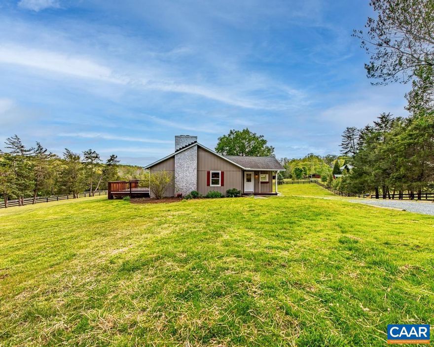 A short, pretty drive from downtown, this deceptively large home is renovated and move-in ready. There's an all-new kitchen, upgraded electric, new lighting, refinished floors, and fresh paint throughout. Fireplaces were recently cleaned and inspected. Three new decks including a huge one off the great room overlook the quiet beauty of surrounding horse farms. The partially finished basement with the second wood-burning fireplace offers potential for additional living space. Propane furnace, replacement windows, and roof new since 2015. Fiber internet is available.,Granite Counter,White Cabinets,Fireplace in Great Room