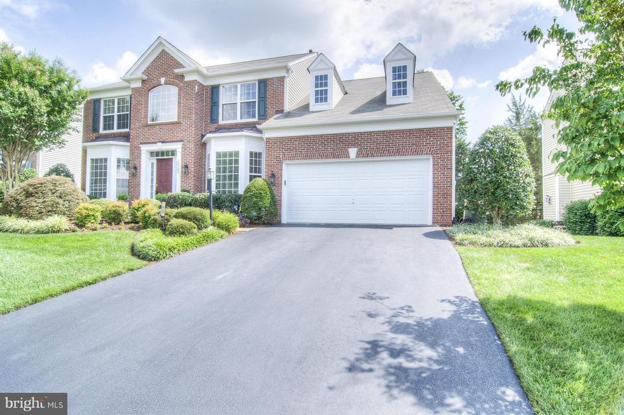 Simply Stunning, immaculately maintained single family home in the Westmarket neighborhood of Haymarket. A large bump-out off the back of the kitchen and basement makes this the ultimate home to entertain large families. The upstairs has 4 spacious bedrooms with a laundry room. The unfinished basement provides a great space for future additional rooms. Professional Landscaping w/ irrigation system