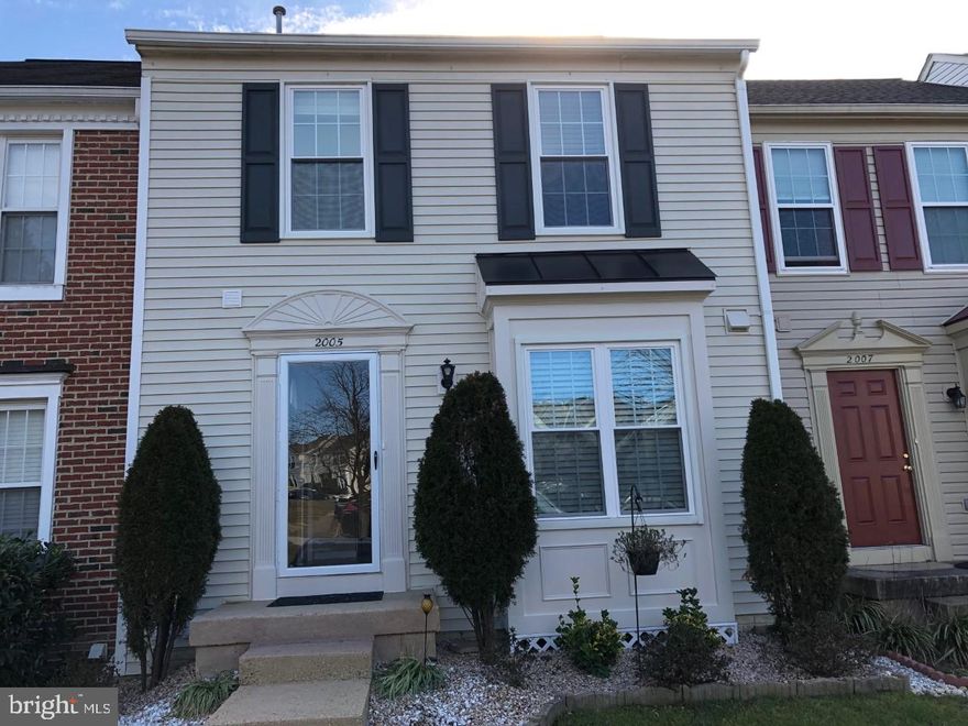 Beautiful move-in ready townhouse in Rolling Brook!  Amazing location minutes to I-95, Route 1, Route 123 and shopping and restaurants!  This three finished level home features fresh paint and new carpet throughout!  Brand new windows and sliding glass doors throughout the home have a lifetime warranty.  New roof, gutters and vinyl siding have all been done in the last 3 years!! The eat-in kitchen features ceramic tile flooring, newer appliances and a pass through looking out to the dining room.  Dining room also features ceramic tile flooring and steps down to the living room that offers a ceiling fan and walks out to the deck.  Upstairs you will find three bedrooms and two full baths.  All bedrooms have ceiling fans with overhead lighting.  The master bedroom has a vaulted ceiling, double closet and attached full bath.  Fully finished walkout basement has a spacious rec. room, fourth bedroom (NTC) and a third full bath.   The basement walks out to a dream back yard for entertaining!  Enclosed by a brand new fence is a new covered patio deck with a cable TV (conveys!) and a fire pit!!  There is even a shed for your storage needs.  Other features of this home include new custom blinds and valances, recently replaced hot water heater and AC unit.