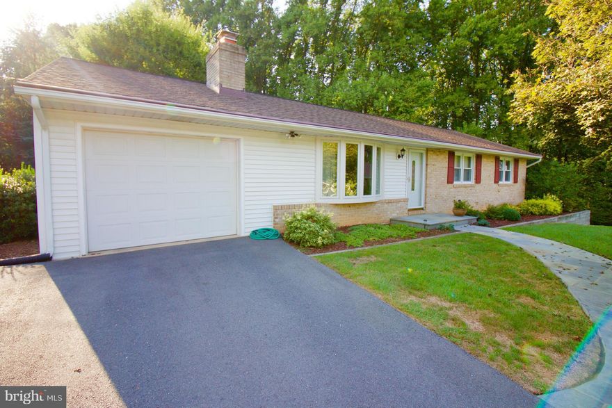 Move in ready, private setting on cul de sac.  Beautifully maintained and updated, this home boasts first floor master bedroom, living room with gas fireplace, updated kitchen and dining room.  Deck overlooks huge back yard backing to woods.  Basement includes finished area for den or office, and plenty of storage.  Bright and neutral, ready for your decorating touches.  Hardwoods and w/w carpet.