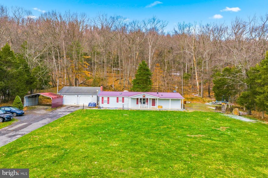 MOTIVATED SELLER - PRICE REDUCTION COME CHECK IT OUT! 25 Min from Hagerstown, 5 minutes from I70. Brand New Water Heater 3/30/26.  Shows great in person! Welcome to 14622 Hollow Road in Hancock, Maryland—where comfort, space, and scenic surroundings come together. This well-maintained home offers a peaceful setting while still providing convenient access to major commuter routes, making it an ideal balance of privacy and practicality.
Inside, you’ll find a thoughtfully designed layout featuring spacious living areas, abundant natural light, and a functional flow throughout. Recent updates enhance the home’s appeal, including a newly painted kitchen, updated flooring, and a refreshed hall bathroom—offering a clean, modern feel while maintaining warmth and character. A 2024 whole-house all-in-one HVAC system provides efficient, year-round comfort and peace of mind.
Step outside to enjoy the surrounding landscape, where open space and natural beauty create the perfect backdrop for outdoor living. From quiet mornings to evening gatherings, this property offers a lifestyle that embraces both tranquility and convenience.
Don’t miss the opportunity to own a beautifully updated home in this desirable area of Hancock—schedule your private tour today.