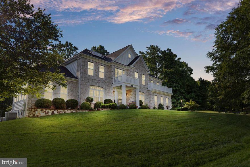 Offers Accepted!  Waiting on last few initials.  Stunning brick-front colonial featuring a sunroom and an array of custom upgrades! This meticulously maintained home boasts elegant touches including custom window treatments, a tankless water heater, and window tinting. Enjoy outdoor living with a large composite deck, gazebo, retaining wall, and wired storage shed, along with a new playset for added fun. Modern conveniences include a Level 2 EV charger in the garage, programmable thermostats, and solar panels for energy efficiency. Inside, discover hardwood floors, granite countertops, and wrought iron stair spindles. With a total square footage of 6,904, this home offers ample space and grandeur, accentuated by 2-story ceilings and 9ft+ ceilings. Situated on  a coveted 1/2 acre, located in a private cul-du-sac, this property offers both space and privacy. The basement is a haven with daylight, full, rear entrance, rough bath plumb, sump pump, and walkout level features. The renovated primary bathroom adds luxury, while the finished lower level offers entertainment options with a theater room, exercise room, and bar. Ideally located near Woodmore Towne Centre, the University of Maryland Capital Region Medical Center, and Metro stations for easy commuting. Don't miss the chance to call this your new home!