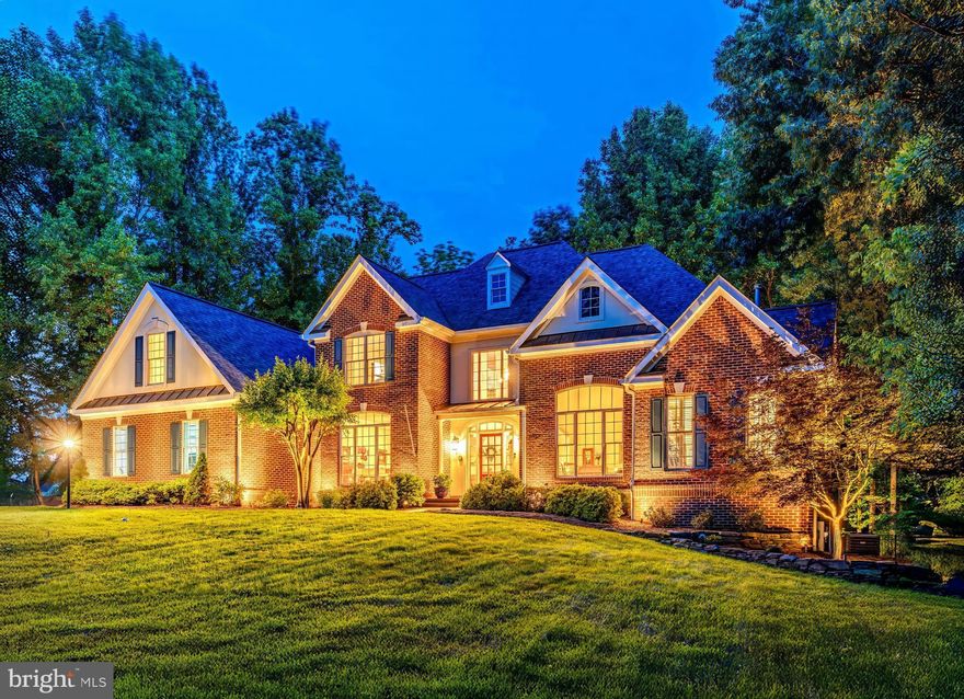 This custom built Oakmont executive home provides the following amenities. 4200 sqft of finished space located on 2 above ground levels, with a framed ready to be finished walkout terrace level boasting an addition 2900 sqft. This 3 sided brick home is opulently appointed with primary and guest rooms on the main level and 2 large bedrooms 
with an added bonus 5th bedroom/game room up and a fully featured library/study loft overlooking the family room. It has a magnificent multi-vaulted first floor with 15 ft living room, 19 ft family room, 13 ft breakfast room, 12 foot trayed primary on main and a 10 ft trayed dining room with heavily upgrade trim throughout as well as 4 sky lights. Additionally the 2900 sqft full walk out terrace level has been pre framed for a breakfast area, party room/common room, exercise room, kitchen, sleeping area, closets and bath and storage and rough-ins for an additional bath and wet bar and provisioned for a gas fireplace in the party room. Additionally, the terrace level HVAC has been pre installed with finished ducting and there are provisions for a media room suitable for a additional home theater on this level. This 3 car garage home has a custom gourmet kitchen loaded with top of the line appliances, upgraded granite, built-in SubZero M refrigeration and features that can only be found in a fully custom built home. Located on a private 2+ acre wooded lot in close in Fairfax Farms. The home is located conveniently close to Vienna Metro, Fair Lakes and Fair Oaks Mall and centrally located to Reston, Herndon, Tyson's, Fairfax and the Falls Church
commercial areas and located in top Fairfax Schools districts. The home is fully hardwood finished in place red oak floors and stairs or tile in all areas.  The home is complete with top grade custom built-in cabinetry with entertainment centers and bookcases in the Family Room and Primary  Sitting  room and custom book cases in the Loft and Family room. The primary bath has a fully tiled 2 person shower with 6 HansgroheTM shower heads served by separate thermostatic controls for each user, and a HeatRail heated towel heater. The primary suite is completed with a huge 2 person walk in closet room. A 3 sided brick French Country design home with stucco appointments and copper flashing has a rear elevation finished in Certainteed concrete composite planking, a 50 year siding. The home is completed in a decorator paint scheme in Sherwin Williams TM premium finishes using SuperpaintTM, ProClassicTM trim and EvercleanTM paints. There are 2 fireplaces, a stacked stone with custom mantel surround wood burning fireplace in the family room and a 3 sided gas fireplace finished in imported Spanish tile in the primary bedroom opening on a private sitting room. This sitting room adjoins its own private deck with a 6 person SundanceTM spa with OzonatorTM andlift cover, and a fully fenced back  yard.  Additionally, each bedroom has its own bath and closets. A powder room finished with all forever brass fixtures is located off the Foyer/Family room. This open plan home is fully featured for support of a disabled person for main level living with ramp access off the garage and a master suite equipped to handle wheel chair support for bathing and sanitary needs. 40A 220V plug in charger for a EV or Plug in Hybrid in the garage.  Beautiful screen porch & deck off the kitchen and mail level primary suite.  2+ acres in a serene natural setting in a hidden gem of a neighborhood. This home truly combines comfort, function and elegance.  ****OPEN HOUSE 12-3PM SUNDAY 6/1/25*****SELLER RESERVES THE RIGHT TO ACCEPT AN OFFER PRIOR TO THE OPEN HOUSE OR BEFORE ANY OFFER DEADLINE (WHICH IS NOT CURRENTLY SET)