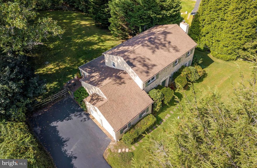 Just in time to enjoy the beauty of autumn, 3304 Chatham Place is ready to welcome you home for every season. Nestled at the end of a quiet cul-de-sac in the heart of Media, this spacious 4-bedroom, 2.5-bath home offers the perfect balance of classic charm, thoughtful updates, and a private setting that backs directly to Ridley Creek State Park. Located in the highly awarded Rose Tree Media School District, this property combines everyday convenience with the tranquility of nearly two miles of preserved parkland right outside your back door. From the moment you arrive, the home’s timeless stone and siding exterior, 2-car garage, and expansive 6-car driveway make a lasting impression. Step inside to a welcoming foyer with hardwood floors and a modern ceiling light. To the right, a cozy living room features crown molding, chair rail, a wood-burning fireplace, and carpeted floors. To the left, a versatile den with double closets offers the perfect space for a home office, reading nook, or even an additional bedroom. At the heart of the home, the formal dining room showcases hardwood floors, elegant trim, and sliding glass doors that open to a large deck—ideal for indoor-outdoor entertaining. The updated kitchen is as functional as it is stylish, with granite countertops, stainless steel appliances, luxury vinyl plank flooring, and a breakfast bar. Just beyond, the family room provides another inviting space with crown molding, chair rail, and access to both the garage and screened-in porch. Step outside to your private backyard retreat, complete with a screened-in porch, ceiling fan, fenced yard, and brick patio. Whether it’s summer BBQs, morning coffee, or quiet evenings, this outdoor space is designed for relaxation. A laundry room and powder room, both with matching LVP flooring, complete the main level. Upstairs, the primary suite is a true retreat with a spacious bedroom, walk-in closet, and en-suite bath featuring a step-in shower and tile flooring. Three additional bedrooms and a full hall bath with tile floors and a tub/shower combo provide plenty of space for family, guests, or hobbies. The finished basement adds valuable flexibility with carpeted flooring—perfect for a home theater, playroom, or gym—along with ample space for storage and utilities. Beyond its thoughtful layout, the location is second to none. You’ll enjoy the peace and privacy of a cul-de-sac that borders Ridley Creek State Park, while still being minutes from Media Borough’s shops, restaurants, “Dining Under the Stars,” and year-round community events. With easy access to I-95, I-476, Center City Philadelphia, and the airport, this home truly offers the best of both worlds. Don’t miss the opportunity to make 3304 Chatham Place your new home.