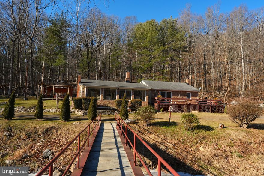 Charming 3-bedroom, 2-bath home situated on a beautiful 3-acre lot. The property features a deck overlooking Manassas Run Creek, which runs through the property, creating a peaceful and scenic setting rarely found this close to town.
With its proximity to Front Royal, Shenandoah area attractions, and major routes, the property also offers strong potential as a short-term rental, weekend getaway, or investment property (buyer to verify intended use). Just minutes from downtown Front Royal and with quick access to Route 66.
Enjoy the convenience of being close to shopping, dining, and services while still feeling tucked away in a quiet, natural setting. With acreage, water features, and an excellent location, this property offers exceptional upside for the right buyer.
Ideal for those seeking a country setting with town convenience and investment potential.
The sellers are in the process of packing, so the home is currently occupied and not fully staged. This property offers a great opportunity for a buyer looking to add their own finishing touches and build instant equity.