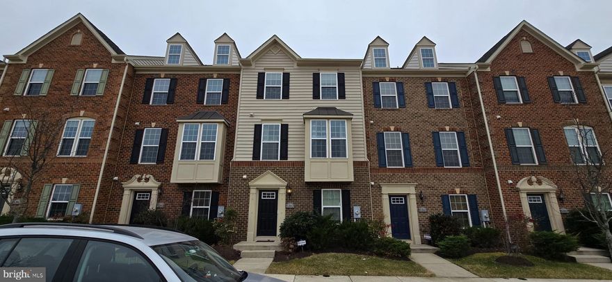 Welcome to this stunning townhome located in the highly sought-after Greenbelt Station community. This beautifully designed home features a 2-car garage and overlooks the community’s lush greenspace, offering both elegance and comfort. The entry-level foyer leads to a private bedroom and full bathroom—ideal for guests, a home office, or a quiet retreat. Upstairs, the main level boasts a modern gourmet kitchen, an eat-in dining area, spacious living and family rooms, and a convenient half bath. Enjoy fresh air and relaxation on the walkout balcony just off the main level. The top floor offers a luxurious primary suite with a spa-like bathroom and large walk-in closet, along with two additional bedrooms, a full hall bath, and a laundry room for added ease.

Greenbelt Station is a vibrant, walkable neighborhood with tree-lined streets and wide sidewalks, perfect for biking or a leisurely stroll. Commuting is a breeze with close access to the Greenbelt Metro and MARC station—plus a community shuttle—along with I-495, the Baltimore/Washington Parkway, and Route 1. The location is just minutes from the University of Maryland-College Park, NASA Goddard Space Flight Center, and an array of shopping, dining, and entertainment options.