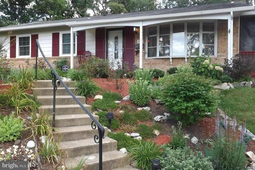 Gorgeous and Spacious Open Floor Plan, 4BR, 3BA updated 2 Finished Level BR Rambler on Huge Wooded Lot located on Cul De Sac.Bright and Airy Model Condition Home, Kitchen  with New Granite Counters, Breakfast Nook plus Bay Window, Main Lvl Hardwood Floors. Private Screened in Porch, Custom Deck & Lush Landscaping.Fully Fin LL w/French Doors, 12' Brick Hearth FP. Don't let cat out ,LB on Right