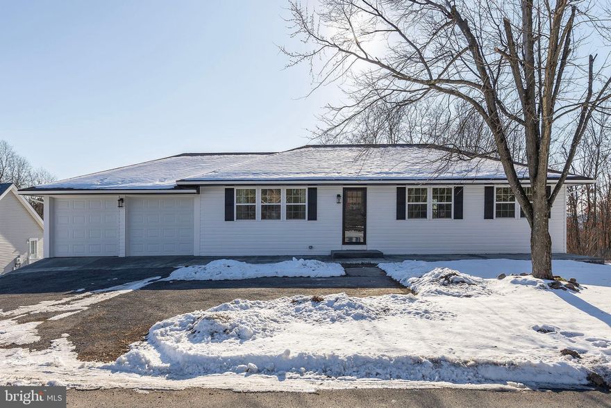 THE SEARCH IS OVER!!  IF THIS ONE DOESN'T CHECK A LOT OF YOUR BOXES, NOT MANY WILL.  WITH WELL OVER 2000 SQ FT OF FINISHED SPACE,  A 2 - CAR ATTACHED GARAGE, AND EVERYTHING BRAND NEW,  THERE ISN'T MUCH NOT TO LIKE.  RECENTLY UPDATED WITH QUALITY MATERIALS AND CRAFTSMANSHIP, YOU WILL FIND THIS HOME TO BE SPACIOUS, INVITING, AND MODERN.  EXTERIOR UPGRADES INCLUDE CONCRETE PORCH, SIDING, WINDOWS, DOORS, AND GUTTERS. MECHANICAL UPGRADES INCLUDE HVAC, PLUMBING, AND ELECTRIC.  INTERIOR UPGRADES INCLUDE EVERYTHING!!  THE PICTURES SPEAK FOR THEMSELVES!  LOCATED ALONG A STATE MAINTAINED  ROAD 2 MILES FROM THE QUAINT SMALL TOWN OF FORT ASHBY, THE HOME SITS ON ALMOST 1 1/4 ACRES WITH A LARGE REAR YARD AND NO RESTRICTIONS.  BRING THE CHICKENS!  NO DETAIL HAS BEEN AVOIDED IN THE RESTORATION OF THIS PROPERTY.  YOU WILL HAVE TO SEE IT FOR YOURSELF TO APPRECIATE IT.  SCHEDULE AN APPOINTMENT TODAY,  THIS ONE MIGHT GO QUICK!