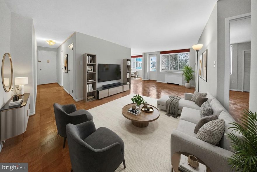 Rarely available 3 Bedroom, 2 Full baths, with the 3rd Bedroom converted to a gorgeous office. Great natural light beaming in on the wood floors with a beautiful south western exposure. Renovated kitchen with granite counters, built in microwave and  breakfast table area. Loads of closet space. GARAGE PARKING INCLUDED. All utilities, electric, gas, water/sewer, upgraded internet and cable included in the monthly condo fee. All building amenities, pool, tennis fitness room, 24 hour front desk and lobby included in the condo fee! No smoking building just steps to Grosvenor Metro and steps to Strathmore Arts Center.  Almost 1,500 square feet of living space!