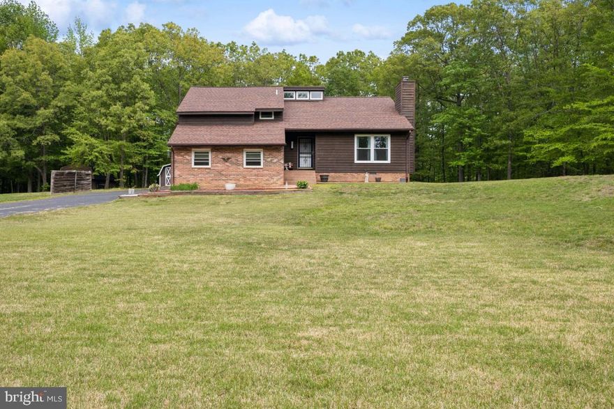 THIS IS THE ONE you've been waiting for!  Situated on a quiet street in the desirable Clark's Run community, this charming, yet elegant, newly remodeled home has it all!  Natural lighting is exposed in every space with thoughtful touches throughout. No detail was missed!  There is plenty of room for everyone with 4 bedrooms, 3 full baths, and two living spaces. The completely remodeled kitchen boasts gorgeous granite counter tops, soft close cabinetry, sleek stainless steel appliances, new LVP flooring, and modern fixtures throughout.  The main level oozes charm with its open layout that flows seamlessly into the living room with shared vaulted ceilings and exposed wood beams.  Step out of the kitchen and onto the oversized deck through brand new french-doors with enclosed blinds - perfect for relaxing or entertaining!  Down the hall you'll find the primary bedroom with his and her closets and ensuite along with two additional bedrooms and a shared hall bath.  The lower level offers the opportunity for additional rental income with its own private entrance, living space and plenty of storage.  Enter the spacious rec room through the driveway side entrance or connected stairway.  Next, you'll find a fourth bedroom with two large closets, a full bathroom with walk-in shower, and the laundry room with an all new top of the line washer and dryer.  As a new homeowner, you’ll have added piece of mind with all the major components that have just been replaced. The list includes a new roof, new windows, HVAC system, plumbing, electrical panel and wiring, french-doors and garage doors!  All this on a flat, one acre lot within walking distance of the community lake, stocked with fish. For the outdoor lover, the backyard is the perfect space  to create your own oasis and well suited to add a large pool! Homes in this community are nicely spaced, and the wide streets and low volume of traffic make this a great place for outdoor exercise and enjoyment.  There is no HOA but a voluntary community organization for $25 per year is in place.  This home is eligible for 100% financing through USDA Rural Development or VA (if qualified).  Great commuter location for Pax River, Indian Head, VA and DC - commuter lots are less than 5 miles away.  Don't miss the opportunity to be in your new home by summer... this one won't last long!