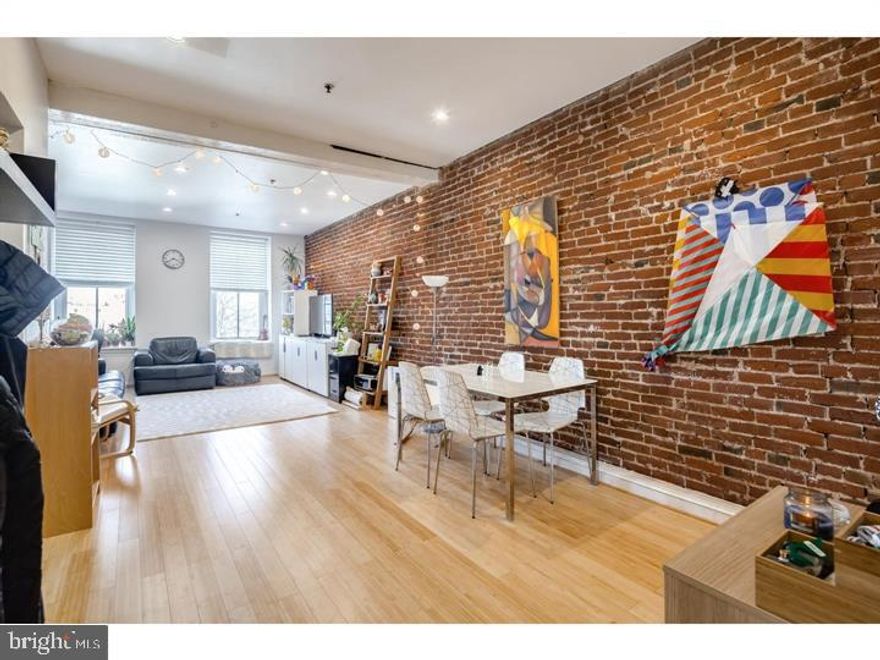 Bright and sunny 2 bedroom unit with character available at the Malt House! Enjoy city views from your private primary bedroom deck with weather sealed door, exposed brick reaching high ceilings, updated kitchen, hardwood flooring, in-unit washer/dryer, newer air conditioning unit, and all day sun from east/west exposure.  This bright and airy unit offers the best of Old City living - steps from fantastic restaurants, historic sights such as Elfreth's Alley, and all the activities along the river!