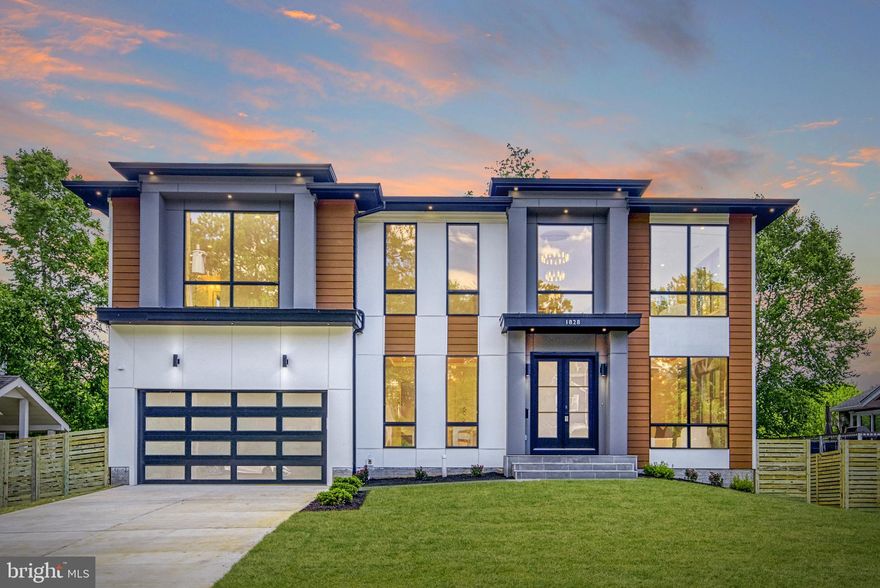 **seller concession available** If you are looking for a modern prairie-style home, look no further than this newest home by Green Valley Custom Builders! Located on a tranquil tree-lined McLean street, this home offers over 7,300 sf of exquisite finished space and plenty of outdoor living. This elegant home invites you in with a light-filled 2-story foyer that welcomes you to an open living room and dining room area that is ideal for hosting sophisticated gatherings or unwinding with your family in comfort. The family room featuring a stunning fireplace surrounded by a full height backsplash is perfect for those cozy nights in. With Thermador stainless steel appliances, a large walk-in pantry, a gorgeous island with quartz countertops and a butler's pantry, this gourmet kitchen will be a joy to cook in. The main floor suite includes a large bedroom, walk-in-closet and a curbless shower. The sunroom, covered porch and the spacious deck offer multiple ways to enjoy your private outdoor oasis. The upper floor is thoughtfully designed with a luxurious owner's suite that includes a sitting area, balcony, separate walk-in closets, deep soaking tub, and a glass enclosed steam shower. Three more spacious upper floor suites each offering ample space and natural light. The finished basement features a well-appointed recreation room, wine storage, exercise room, media room, and a large suite. Don't miss this opportunity to live your dream life in this magnificent home. This property truly embodies the epitome of refined living in a tranquil yet convenient location, close to airports, Tysons Mall, and the Tysons Metro.