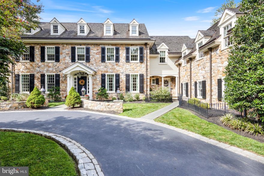 Welcome to this stunning center hall estate nestled in a tranquil and private setting in Wayne. Situated at the end of a quiet cul-de-sac, this extraordinary property offers a wealth of luxurious living spaces and an array of incredible features that are sure to impress.

As you step inside, you'll immediately notice the exquisite hardwood floors that grace the main level. The first floor boasts a spacious living room with a  fireplace, perfect for formal gatherings. A sunroom  provides a serene space for unwinding and tranquility, while the office/study offers a quiet retreat for work or study.

Indulge your culinary desires in the custom kitchen, complete with Thermador gas range and ovens, quartzite counters, a kitchen island, and top-of-the-line Sub Zero built-in refrigerators/freezers & wine refrigerator. The formal dining room is ideal for hosting memorable dinner parties and special occasions.

The family room is adorned with a fireplace and features a palladium window that fills the space with warmth and natural beauty. From here, step out onto the Trex deck, where you can enjoy al fresco dining or simply relax while overlooking the heated swimming pool.
Retreat to the upstairs primary suite, which includes a connected office for added convenience. The suite also boasts three walk-in closets, ensuring ample storage space. The ensuite bathroom is a sanctuary of rejuvenation, complete with double vanities, a shower, and a luxurious whirlpool tub. Four additional guest bedrooms and two bathrooms provide comfort and privacy for family and friends. A large recreation room/flex space offers endless possibilities.

Descend to the lower level and discover a haven for refreshment and enjoyment. A pool table awaits in the spacious recreation area, perfect for friendly competitions and leisurely evenings. A wet bar beckons for entertaining, while a sitting room with a fireplace creates a cozy ambiance. French doors lead out to the pool, seamlessly blending indoor and outdoor living. A wine cellar provides the perfect space to store your prized collection. Stay active and healthy in the exercise room, and take advantage of the ample basement storage for all your organizational needs.

The stunning Pennsylvania fieldstone exterior, Hardie board siding, and cedar shake roof create an elegant facade. The three-car oversized garage provides ample space for vehicles and storage. The heated swimming pool, hot tub, and fire pit offer the perfect setting for outdoor entertainment and serenity. The two-tiered Trex deck features a built-in grill, making it the ultimate space for hosting summer gatherings and barbecues.

One of the most coveted highlights of this property is its proximity to the renowned Chanticleer Garden, as it backs up to this natural oasis. Immerse yourself in the beauty of nature and enjoy the tranquility that comes with such a privileged location.

Don't miss the opportunity to make this exceptional Wayne residence your own. Schedule a showing today and experience the epitome of luxury living in a serene and private setting.