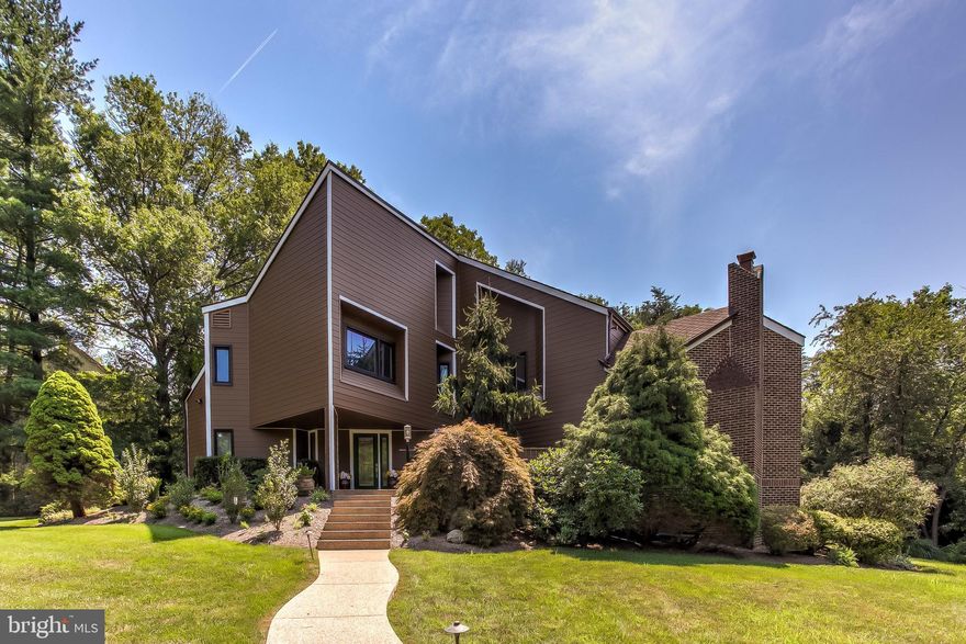 Welcome to this luxurious custom home located on one of Columbia's finest lots in desirable Hobbit's Glen! Set on over half an acre, this architecturally-inspired home has loads to offer. Five bedrooms, 4.5 bathrooms, and 4 finished levels provide ample space for daily living and entertaining indoors and out. Step up to a grand living room that features a soaring ceiling and wall of windows overlooking the private, tree-lined backyard, with in-ground pool and beautiful low-maintenance landscaping. More backyard views are available from the elegant formal dining room. The gourmet kitchen boasts sleek cherry cabinetry, double wall ovens, a gas range, and a 9-foot island, and opens to an inviting family room with gas fireplace and slider to the rear deck, as well as lovely and bright breakfast room that steps out to a sky-lit screened porch. Upstairs, the master suite is a sophisticated private retreat with a spacious en suite bath and plenty of closet space. Three more generous bedrooms, a large hall bath and a well-located laundry room complete this level. Ascend to the loft, which provides more flexible living space with its own en suite bath and extra-large walk-in closet, ideal for use as a fifth bedroom suite, home office or hang-out room. The lower level provides additional finished living space that leads to the picture-perfect backyard, along with an oversized bathroom and ample storage. Outside, the private yard, pool, landscaping, hardscape and HardiePlank siding will make even the most discerning buyer fall in love. Walk to tennis, golf and the clubhouse restaurant. Live the resort lifestyle in a quintessential Columbia neighborhood! (Please note, finished square footage in public records is incorrect. It does not include the finished 4th level.)