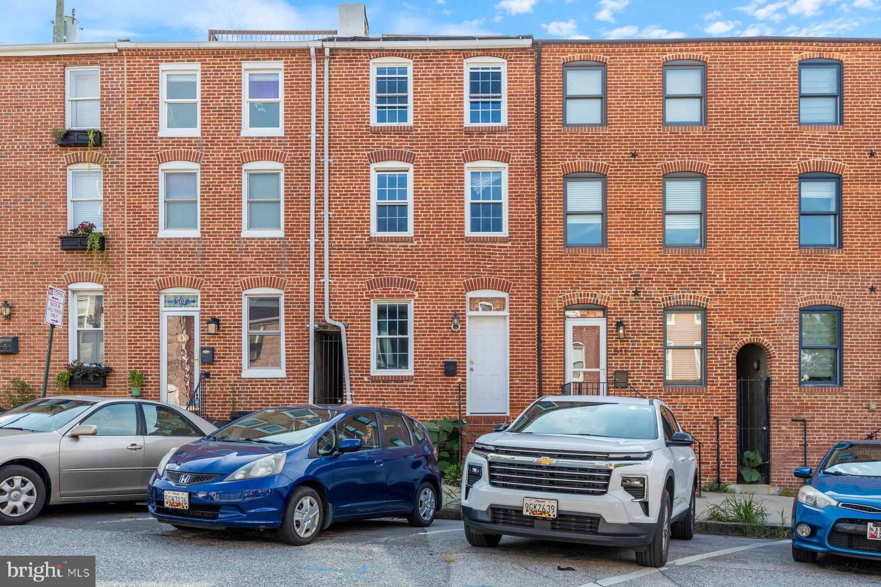 Including a BEAUTIFUL rooftop deck with gorgeous views, this Move-in ready 3BR/2BA brick Townhome located on a quiet street in the Fells Point and Patterson Park neighborhood. Park just steps from the front door into your new home. Step into a home offering natural light, easy care flooring, and a soft color palette. The main floor features a spacious living room and dining room, a kitchen filled with plenty of cabinets and counter space, and a full bath. On the second floor is a large primary bedroom with a fireplace, a walk-in closet and shared access to a full bath and laundry. On the third floor are two similar sized secondary bedrooms both with vaulted ceilings, and one with a fireplace. This home is ideal for any new homeowner and is conveniently located in close proximity to shopping, restaurants, and commuter routes!
The rooftop deck does need repairs, please do not try walking up there. Priced low to give you equity in the fix-up! Deck sold in as is condition, but if you need a contractor, we have an MHIC licensed contractor who gave a bid of only a few thousand dollars, and your beautiful rooftop deck will be good as new, for your eyes to enjoy the views of one of the best roof top locations in the city!
Welcome home :)