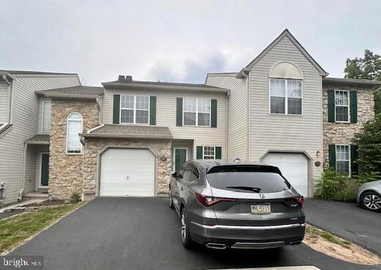 Newly renovated, stunning 4-Bedroom and 2.5 Bathroom Townhome in Desirable Berwick Place – Move-In Ready!
Welcome to this newly renovated, stunning 4-bedroom, 2.5-bathroom townhouse, perfectly nestled on a quiet cul-de-sac in the highly sought-after Berwick Place community of Norristown. Backing to serene woods and a tranquil pond, this home offers the perfect blend of privacy, space, and modern comfort.
As you step into the gracious living room, you'll immediately feel the warmth and coziness of home. The open-concept main level is ideal for both everyday living and entertaining, featuring gleaming hardwood floors, recessed lighting, central A/C, and a charming wood-burning fireplace. A sliding glass door leads to an oversized deck with breathtaking views of the wooded landscape and community pond—your private outdoor retreat.
The fully equipped kitchen boasts rich cherry cabinetry, a range stove, built-in microwave, dishwasher, and ample storage space—everything you need to cook and gather with ease. A convenient main-level powder room is located next to the laundry area with washer and dryer included.
Upstairs, you'll find an expansive primary suite with soaring cathedral ceilings, a large walk-in closet, ceiling fan, and a luxurious en-suite bathroom complete with a Jacuzzi tub, Palladian window, and separate shower. Two additional spacious bedrooms on this level each feature ceiling fans and generous closet space, sharing a well-appointed full hall bath.
The finished basement adds exceptional flexibility, with a large open living area perfect for a home office, playroom, or media room, plus a cozy fourth bedroom with plush carpeting throughout.
Additional highlights include - attached 1-car garage and 2-car driveway parking, highly rated Methacton School District.
This lovingly maintained home offers everything you need and more—space, style, privacy, and a peaceful setting—all just minutes from local conveniences - parks, shopping centers, restaurants, and commuter routes. Available for immediate occupancy—schedule your showing today before it’s gone!