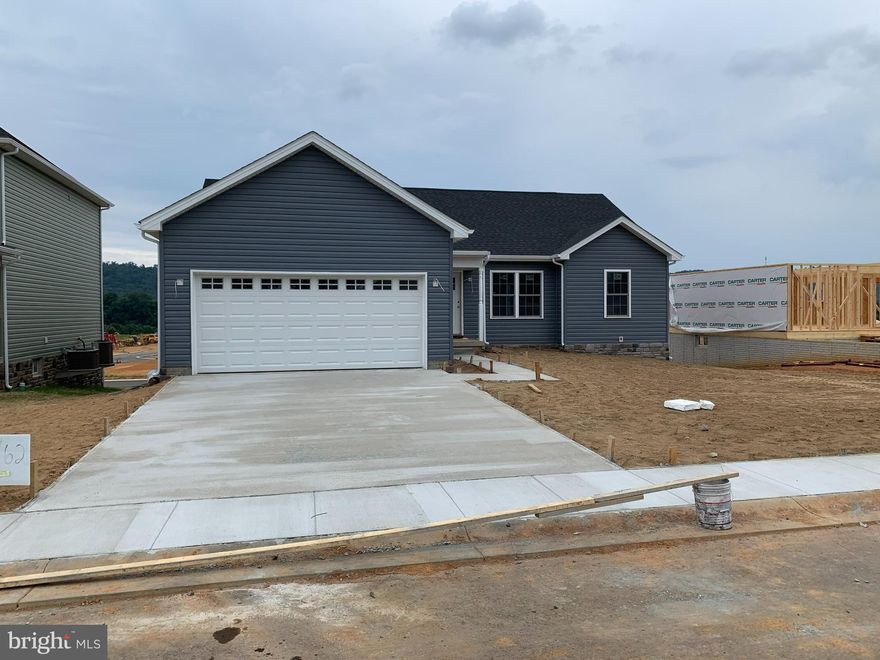 REDUCED TO $359,900,500.00 AND SELLER PAYS $10,000.00 OF BUYERS CLOSING COSTS ON CONTRACT RATIFIED BY 3 AUGUST (WHEN USING PREFERRED LENDER). UNDER CONSTRUCTION WITH COMPLETION ANTICIPATED IN EARLY AUGUST.  [PLEASE NOTE THAT THESE PHOTOS ARE OF SIMILAR CONSTRUCTION].  THIS SPACIOUS RANCH DESIGN OFFERS 1620 sq. ft. OF FINISHED LIVING AREA AND FEATURES A SPLIT BEDROOM DESIGN WITH A GREAT ROOM FEATURING CATHEDRAL CEILING SEPARATING THE MASTER SUITE FROM BEDROOMS #2 & 3. THE EAT IN KITCHEN HAS UPGRADED CABINETRY WITH SOFT CLOSE DOORS AND DRAWERS, GRANITE COUNTERS, A LARGE THREE SIDED PENISULA WITH OVERHANG THAT WILL COMFORTABLY SEAT 6-8, STAINLESS STEEL APPLIANCES AND GARBAGE DISPOSAL. THE SPACIOUS MASTER SUITE FEATURES HIS AND HERS WALK IN CLOSETS, CEILING FAN AS WELL AS A MASTER BATH WITH AN OVERSIZED SHOWER, DOUBLE SINK VANITY AND LINEN CLOSET. ALL ON A FULL (1,620 sq.ft.) WALK OUT BASEMENT WITH ROUGH PLUMBING FOR FUTURE BATH. THE FINISHED TWO CAR GARAGE HAS AN INSULATED GARAGE DOOR AND AUTOMATIC GARAGE DOOR OPENER. ALL OF THIS LOCATED IN AN UPSCALE DEVELOPMENT WITH SIDEWALKS, CURB & GUTTER, CONCRETE DRIVEWAYS AND INDIVIDUAL SIDEWALKS. ENJOY THE MOUNTAIN VIEWS  AND WALK OUT BASEMENT. CALL TODAY TO ARRANGE TO VIEW THIS HOME. THE FLOOR PLANS SHOWN ARE INFORMATIONAL PURPOSES ONLY. THE ACTUAL CONSTRUCTION OF THE HOME MAY HAVE VARIATIONS FROM THE ORIGINAL PLAN.