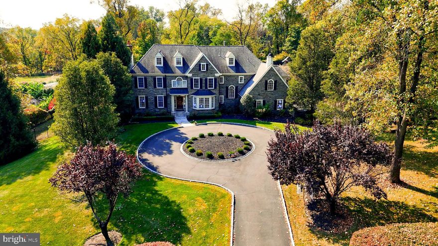 Price Improvement Alert! When you close your eyes and envision the home of your dreams, 1106 Herkness is the image you'll see. Incredible curb appeal, impeccably maintained and no detail over looked inside. With almost 6,000 square feet, this home was custom designed and built in 2005 by David Betz who has an outstanding reputation for attention to detail, including quality construction, and exceptional craftsmanship. A gorgeous stone home in Pennock Woods welcomes you with elaborate moldings and millwork, wainscoting and beautiful wood floors throughout.
A remarkable residence quietly positioned among the elegant estates of Abington. From the moment you approach this stately property, you'll feel transported to a place where timeless charm and contemporary refinement come together seamlessly.

Step inside and immediately feel the warmth and grace of beautifully curated living space. Gleaming hardwood floors, intricate millwork, and expansive rooms create a sense of openness and tranquility. Picture yourself hosting memorable dinners in the formal dining room, or comfortably working from your sophisticated private office.

At the heart of the home lies a magnificent family room, where a massive fireplace commands attention, setting the perfect scene for cozy evenings or festive gatherings. The adjacent chef-inspired kitchen invites culinary creativity, boasting premium appliances, granite countertops, and custom wooden cabinetry that exemplify impeccable taste.

Ascend the staircase to discover generously sized bedrooms, each designed to offer restful comfort and privacy. The primary suite is an elegant retreat, beautifully appointed with luxurious finishes and tranquil ambiance, ensuring peaceful nights and restful mornings.

Journey downstairs to the fully finished basement, where a private spa-like sanctuary awaits. Here, a sophisticated wine room with immaculate wine cellar, dedicated gym area, and thoughtfully designed spaces for relaxation combine to elevate your daily routine into moments of indulgent pleasure. If you have ever dreamed of a Bar in your house, this house will hit the spot.

Venture outdoors to an expansive stone-covered patio, complete with an impressive outdoor fireplace, perfect for year-round enjoyment. Imagine relaxing evenings under the stars, entertaining friends, or savoring quiet moments by the fire.

Above, the home's spacious attic offers extraordinary potential, ready to transform into an additional  1000 sqft floor of refined living.

This home is more than just a property—it's an opportunity to embrace a lifestyle that blends traditional elegance with modern luxury. Moments from exceptional schools, upscale shopping, and cultural landmarks, 1106 Herness Drive is a residence destined to create lifelong memories.

Your new chapter awaits—experience the story of this home firsthand by scheduling your tour when this house hits the market