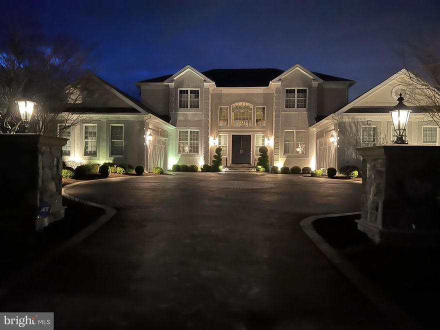 PRICE PERFECTED! Motivated seller – bring us your best offer! The seller is open to negotiations and eager to work with you. 

Don’t miss out on this opportunity!

Perfectly situated close to the Potomac River on a stunning 1.03-acre retreat, the refined architectural details of this Colonial masterpiece are sure to captivate you. Experience the charm of impeccably landscaped grounds and a striking façade, highlighted by elegant stone columns and a grand driveway. The property features a thoughtfully designed four-car garage, with two garages on either side, seamlessly blending functionality and style. Step inside to exquisitely appointed space with masterful detailing like tray ceilings, crown molding, and chair rails throughout. The entry foyer invites you in with a grand double staircase. Continue into the main living room, featuring soaring ceilings, creating an open and inviting atmosphere.

Formal living and dining rooms offer the perfect backdrop for hosting large gatherings or more intimate occasions. The gourmet kitchen (RENOVATED in 2021)  is sure to delight and inspire even the most demanding of chefs with a suite of high-end  Wolf Kitchen Appliances, including a four-burner gas range. The beautiful kitchen opens to a spacious breakfast room drenched in natural light and a large yet cozy family room. Adjacent to the family room, a sunroom provides an inviting space bathed in light, and a deck, accessible from the family room, offers a serene outdoor escape. An en-suite guest bedroom and a private office, conveniently located next to the living room, complete the main level.

On the upper level, the thoughtfully designed primary suite is perfect for relaxing in unparalleled luxury and comfort. This wing of the home features a sitting room, two walk-in closets, and a spa-like bathroom. Down the hall, three more generously sized bedrooms await. On the lower level, find an expansive recreation room, card room, lounge, and gym. Do not miss the exquisite wine cellar and theater room, appointed with a top-of-the-line entertainment system and inviting recliners.

A private outdoor oasis awaits in the rear of the property with a large yard, perfect for solitude or entertaining. Whether you are in search of peace or a space for gatherings, you are sure to find it here. Located moments from wonderful shops and eateries at Potomac Village, with easy access to I-495.