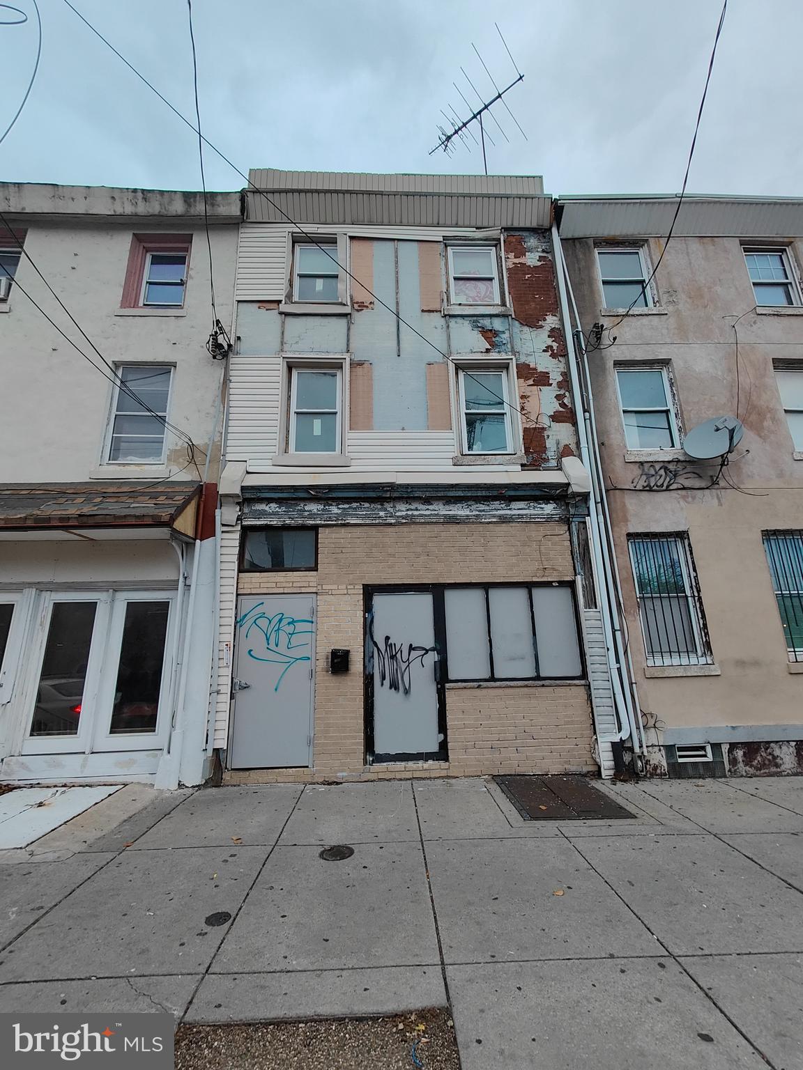 Here's a great opportunity to own a cash cow in the heart of fish town! This property has the potential to be a great revenue generator with the currently floorplan. First floor has a large commercial unit that can be used for multiple purposes. You will also find 2 units on the second and third floor which feature 2 bedroom & 1 bath each. The commercial unit is vacant and will need to be updated. Second floor has all new electrical, plumbing and drywall it 's almost finished and ready to go . Third floor was renovated recently and is currently occupied by the owner, also includes a small balcony. This is a unique opportunity to own a large building in one of the most highly sought after neighborhoods in Philadelphia! Schedule your showing today!