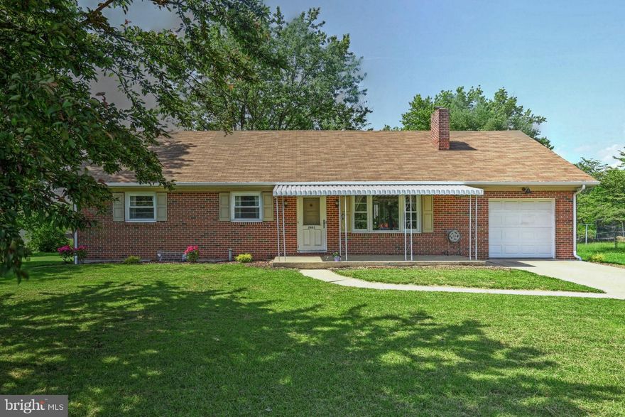 Solid and affordable all brick rancher in convenient west end location.  Huge level fenced rear lot.  Covered front porch.  Living Room with hardwood floors and wood burning fireplace.  Eat in kitchen with breakfast bar and new flooring.  Three bedrooms with hardwood floors.  Bathroom with tile shower surround and jetted tub.  Updated HVAC, replacement windows and two detached sheds.  This home is located directly across from Sunset Park.