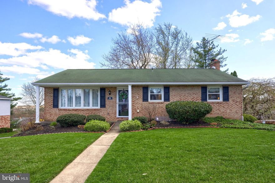 Discover this move-in ready ranch home in Southern York County with a finished lower level! The lower level boasts new luxury vinyl plank flooring, a sunroom, and a spacious family room featuring a floor-to-ceiling wood-burning fireplace. The utility room includes an additional walk-in shower for added convenience. The main living area has a bright, open layout, with a large living room featuring a bay window that lets in plenty of natural light. A formal dining room is conveniently located off the kitchen. The kitchen has been updated with refaced cabinetry, a tile backsplash, and a new double sink. The main floor also includes three generously sized bedrooms, each with new carpet and fresh paint. The fully upgraded bathroom is accessible from the primary bedroom. This home is ideally located near restaurants, shopping, and local amenities, with an easy commute to I-83 and the PA/MD line. Beautifully landscaped with an oversized attached two-car garage.