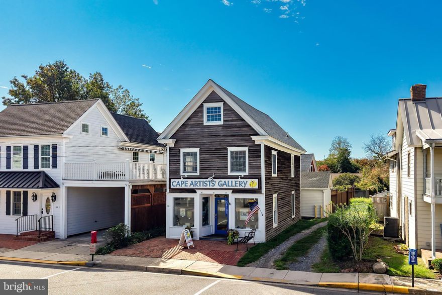 LOCATION, LOCATION, LOCATION and LOADS OF OPTIONS!   Charming Mixed-Use Property in the Heart of Lewes: Discover a rare opportunity in historic downtown Lewes with this versatile three-story property at 110 W. 3rd Street. The first floor features a bright and inviting commercial space, perfect for a boutique, gallery, professional office, or small café — offering excellent visibility and foot traffic in one of Delaware’s most desirable coastal towns.  Upstairs, the second to third floor apartment provides comfortable living with two bedrooms and one full bath, a welcoming living area, and a newly remodeled kitchen ideal for year-round use or as a weekend retreat.  With commercial zoning and dual-use potential, this property is both charming and practical — a unique investment opportunity in a highly sought-after location just steps from shops, dining, and the Lewes waterfront.