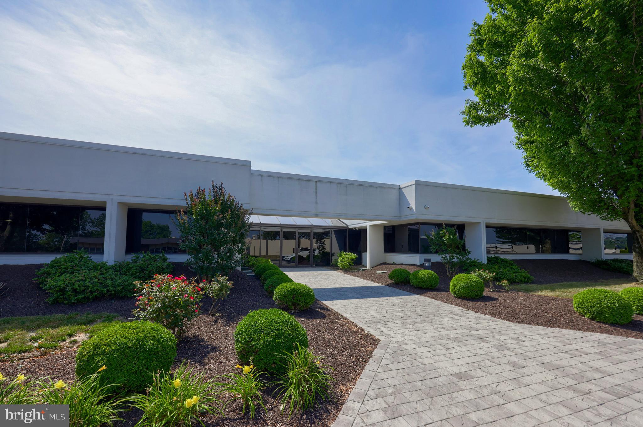 Tour this 2,439 RSF of office space in Wyomissing. Enter this immaculate suite through a private entrance way, followed by a large open area for numerous cubicles. The suite also includes four offices/conference rooms, a large kitchen with seating, an IT room, and an additional room that could be used for a small office or storage. The property has a private parking lot with lighting and ample parking. This suite is listed at $15.00/SF NNN.