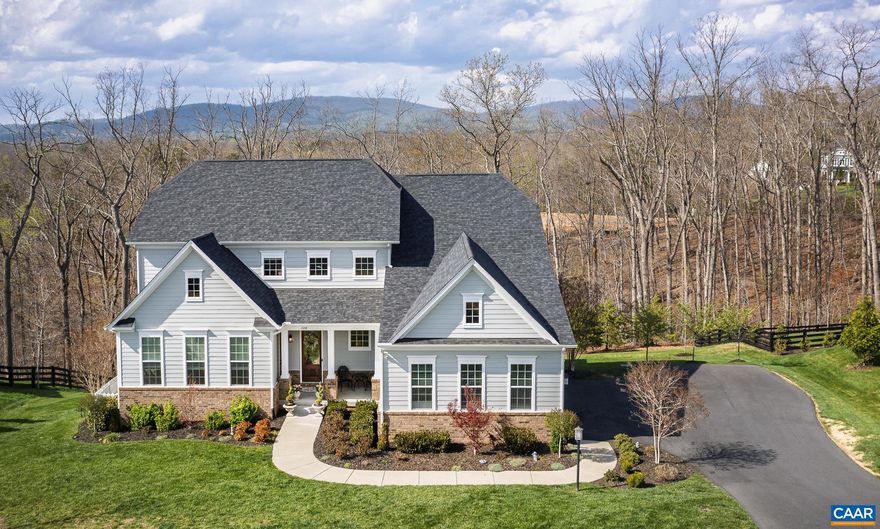 Located in the gated community of Glenmore, this thoughtfully designed 4-bedroom, 4.5-bath home offers over 6,000 finished square feet with an emphasis on space, flexibility, and modern comfort. The main level features soaring 10? ceilings and an expansive family room with a gas fireplace, creating an open and inviting living environment. A standout feature is the attached private residence with its own separate entrance, living room, spacious bedroom, and full bath?ideal for guests, multigenerational living, or a private office suite. Additional feature include an attached 3 car garage garage, Gourmet kitchen featuring Carrara marble and custom cabinetry, washer/dryer, loft, owner's suite features and incredible walk in closet and luxury bathroom, and even additional bedrooms?offering exceptional versatility to suit a variety of needs. The custom terrace level is fully finished with incredible attention to detail:  French inspired kitchen with Viking stove / oven, Bosch dishwasher and subzero refrigerator.  Lighting fixtures are authentic 1920's decor and create an old NYC "speak easy" vibe with tin ceiling.  Enjoy a "better than new" home in Glenmore.,Granite Counter,Maple Cabinets,White Cabinets,Fireplace in Basement,Fireplace in Living Room