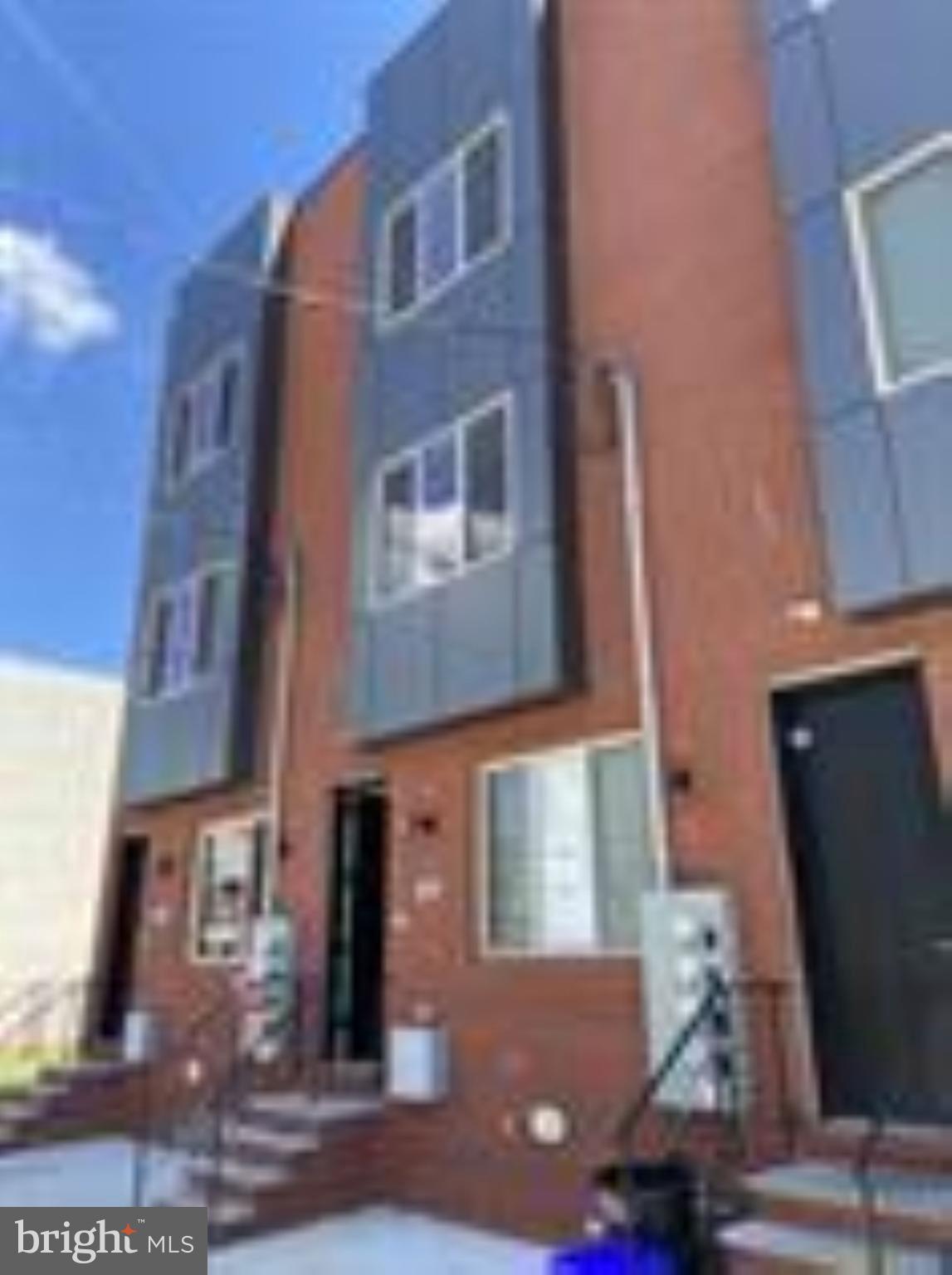 It is a room for rent with a shared space in a new construction building with laundry , central air, hardwood floors.