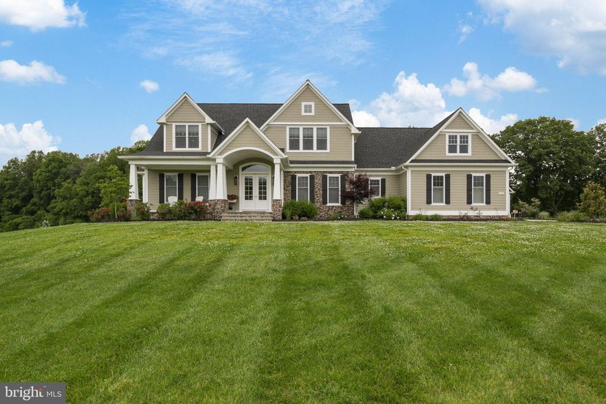 Falls Rd Corridor custom built in 2018, this home has no detail overlooked - the perfect design for the most particular buyer. Flowing open floor plan with 11 foot ceilings allows for tons of natural light and is an entertainer's dream, with the main living area walking out to a private pool setting & enclosed porch with fireplace & outdoor kitchen. The designer kitchen features an oversized island, farm sink, Wolf range, Fisher Pykel dishwasher drawers, Monogram refrigerator, Wolf microwave and pantry. The main level expansive owners suite soaks all the natural light and includes custom walk in closet, heated tile floors, free standing soaking tub, separate vanities and dual soaking shower. The rest of the main floor is thoughtfully laid out with wet & dry bar, home office, separate living or dining room, powder room and an oversized laundry room with built in dog washing station. Upstairs are three spacious en-suites, each with ample natural light and space. The seemingly endless entertainment space continues in the fully finished lower level with 11' ceilings, where the walk out-level recreation room has a full wet bar built with reclaimed wood, tv area with gas fireplace, billiards area and half bath. The entire recreation area opens to the one of a kind HD Golf home simulator system and separate home gym space, all connected to smart house audio system. Three car attached garage plus detached 1 car and extra storage garage. The details, upgrades and customization of this home cannot be found or built for this price today, call before its gone!