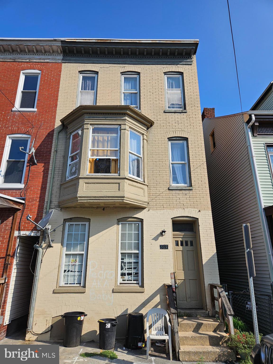 For sale is a 4-unit, semi-detached investment property located at the edge of York City. Key features include off-street parking at the rear of the building and separately metered electric, which is paid by the tenants. The property generates a gross annual income of $33,600. The total reported annual expenses are $10,576, which includes taxes at $5,375, insurance at $1,248, and utilities at $3,953.