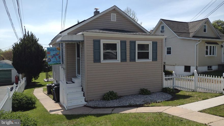 Beautifully well-maintained home in the Rosedale Terrace Subdivision. This home shows "Pride of Ownership".   Family Room open to kitchen with a large formal dining room and a walkout to a large deck, perfect for a family BBQ or Crab feast.  Walk down the deck stairs to a beautiful back yard with another covered deck underneath.  Finished lower basement with heat and air conditioning and a half bath.  Perfect for a home office or for use as a TV or Club Room or just a getaway space.  All neutral paint colors inside, beautifully decorated and nothing needs to be done.  This house lives way bigger than it is with 2 large decks, and a partially finished basement.  Beautiful large lot with lots of green grass.  Two outbuildings, with 1 large outbuilding that has electricity and plenty of storage or room for whatever you desire with finished flooring and a beautifully finished interior.  Another storage shed is also at the back of the property and is currently being used for lawn equipment and gardening items.  Truely the best of both worlds.  This property will not last long.