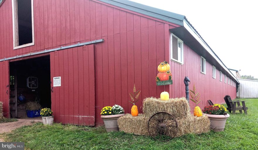 Horse Farm in Upper Bucks County with a 20 stall barn. This property is geared with the Equine enthusiast in mind. If you are into Breeding, Training, Boarding and/or lessons this is the property for you. The 20 stall barn has been arranged with breeding in mind. The barn consists of a feed room, wash stall with hot & cold water,  4 double stalls for mare & foals, with an additional 10 stalls for boarding etc. The foaling stalls are equipped with timers for putting your mares under lights to get ready for the breeding season. The barn also has a small indoor for exercise, 3 separate tack rooms and storage areas. The property offers an outdoor arena located conveniently near the main barn.  There are approximately  9+ acres of pastures with 5ft no climb fencing. Some of the pastures include run in sheds and one private pasture includes a two stall barn.  There is also a smaller pasture for goats, sheep or mini ponies. A large chicken coop is included with approximately 10 ft x 40 ft  enclosure for their safety.
The home's design is a raised ranch, the upper portion (main floor) offers 4 bedrooms, large kitchen, large dining room and a large living room with 2 sliding glass doors to the 2nd  story deck.  The lower level offers an 1000+ sq ft  In-Law Suite with 1 bedroom, kitchen living room, dining area , full bath and laundry room. Private entrance and parking. There is a dog grooming room and waiting room /mud on the first floor (lower level) with parking and private entrance.  All this and a 2 car garage for storage. The property already has Act 319 in place for additional tax savings. Property is being sold "AS IS"
Seller is a licensed Realtor