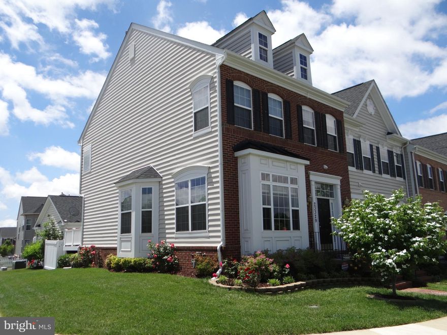 Huge 2950 sqft. GORGEOUS end unit TH with new Brazilian Cherry hardwoods on main and upperlevels. Beautiful kitchen with granite counter tops, new appliances. Master with walk-in closet master bath w/separate shower and soaking tub. Fully finished basement with full bath & storage.