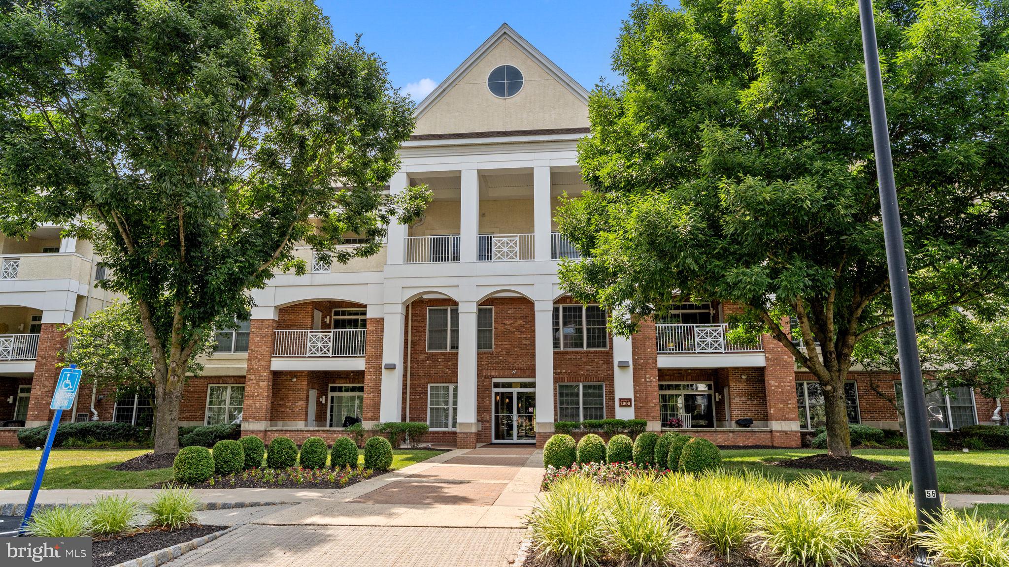 Welcome to Meridian of Valley Square – Premier 55+ Living in Bucks County!
This beautifully maintained first-floor 2-bedroom, 2-bath condo offers 1,651 sq ft of luxurious living space in one of the area's most desirable active adult communities.
Step inside to find an open-concept floor plan featuring a spacious living room with an electric fireplace, a dining area with a refreshment center, and a modern kitchen with solid-surface countertops, tiled backsplash, and a cozy breakfast nook. Engineered wood flooring, full-height interior doors, decorative molding, and fresh paint add an elegant touch throughout.
The oversized primary suite includes a sitting area, large closet with custom shelving, and private bath. Enjoy the outdoors on your private patio with peaceful views — ideal for relaxing. Other highlights include: Laundry room with utility sink, Abundant closet space & private storage unit, Garage, Secure, Beautifully landscaped grounds with walking paths, gazebo, lighted sidewalks & scenic ponds. Just steps away from shopping, dining, and an upscale grocery store, everything you need is right outside your door. Enjoy exclusive access to the 7,000 sq ft clubhouse featuring a fitness center, library, game/meeting rooms, and catering kitchen. Outdoor amenities include a heated pool, walking trails, and more. Live the lifestyle you deserve at Meridian of Valley Square — where luxury meets low-maintenance living!
